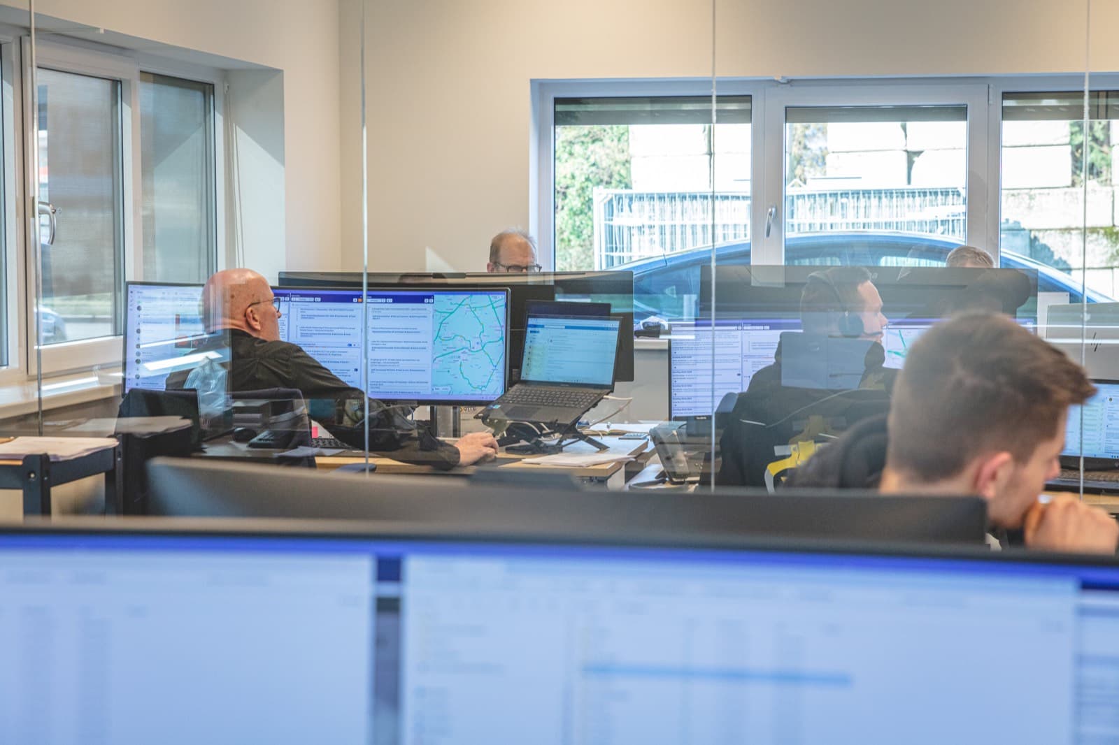 Planners aan het werk in Peanuts op de planningsafdeling